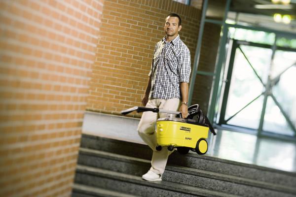 Man with vacuum cleaner