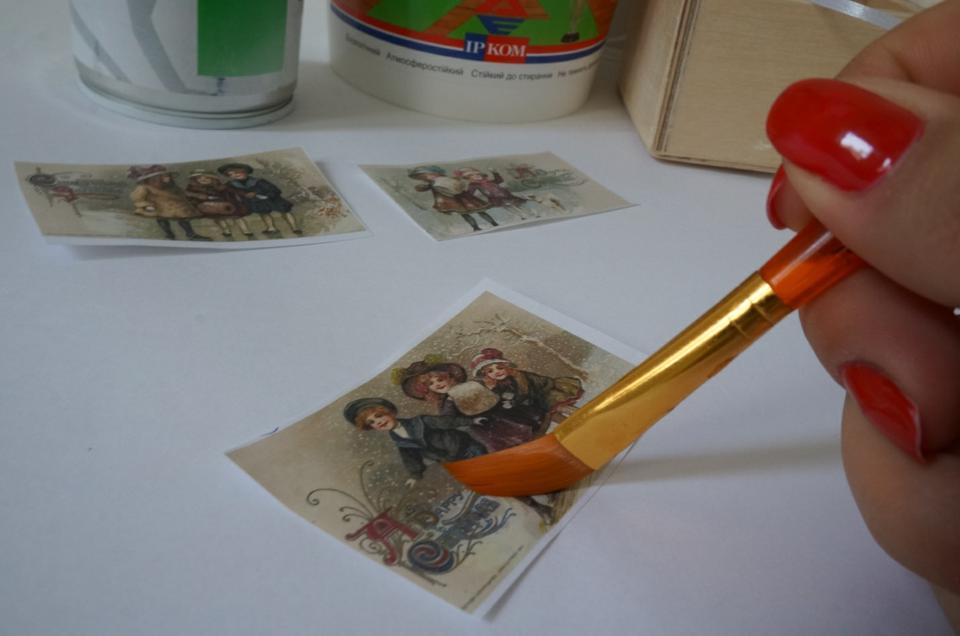 Putting glue on a napkin Decoupage technique