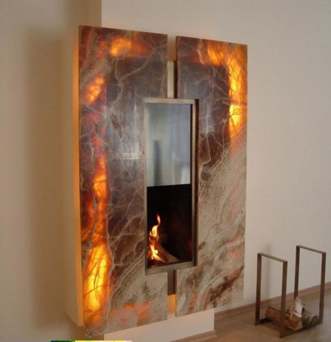 Wall mounted fireplace in interior details Wall mounted fireplace in interior details