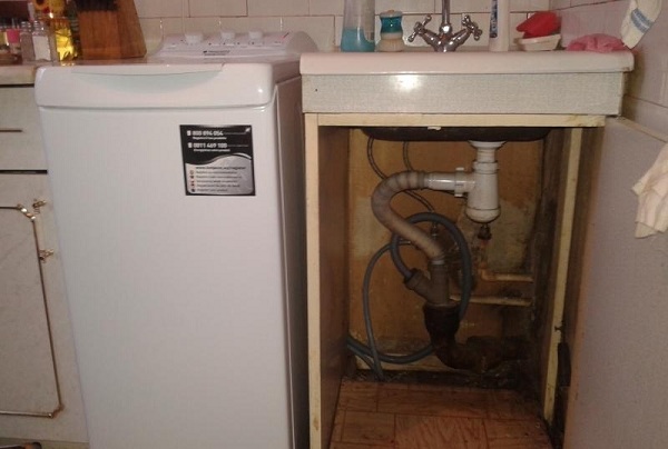 Vertical loading machine in the kitchen