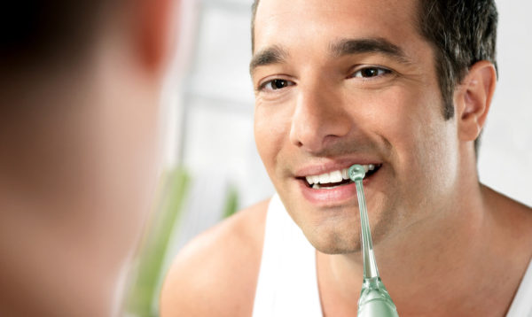 Oral cleaning Cleaning the mouth with irrigator