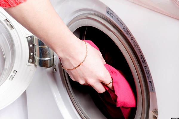 White washing machine with open hatch