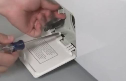 Unscrew the screw securing the cover Unscrew the screw securing the cover