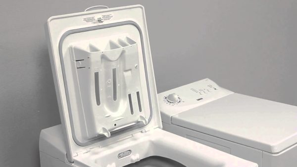 Powder tray in the washing machine with a vertical load Powder tray in the washing machine with a vertical load