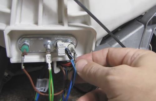 Terminals with wires and temperature sensor, which is installed in the heater Terminals with wires and temperature sensor, which is installed in the heater
