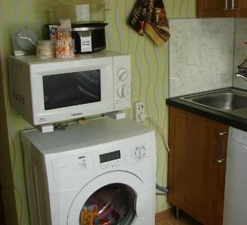 Microwave above washing machine