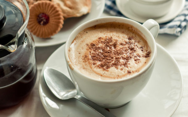 Making cappuccino in a coffee machine