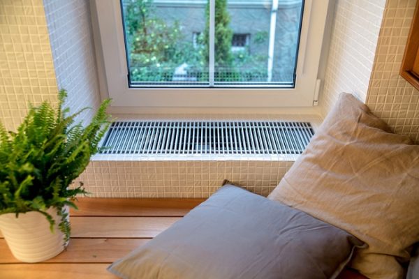 Convector built into the window sill
