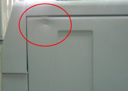 Dent on washing machine