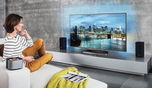 Young woman watching tv