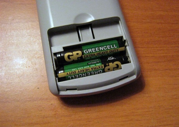 Remote control with batteries