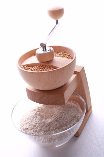 Grinding in a manual coffee grinder