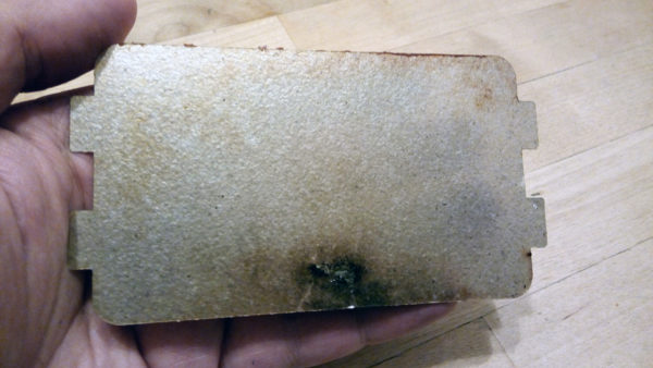 Burned mica plate