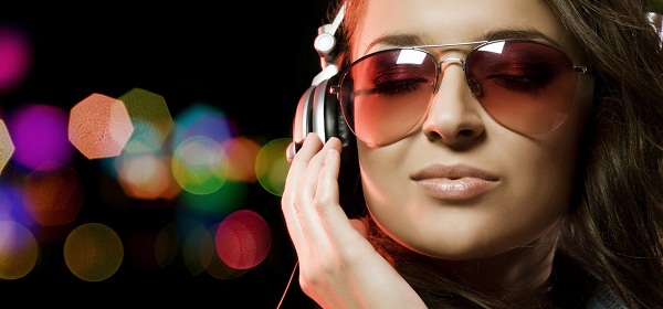 Girl listening to music on headphones