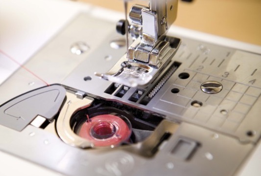 Bobbin with thread