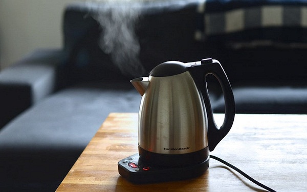 Electric kettle on the table in the living room