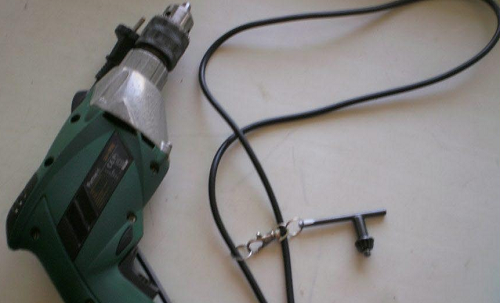 The key is attached to the unit cord