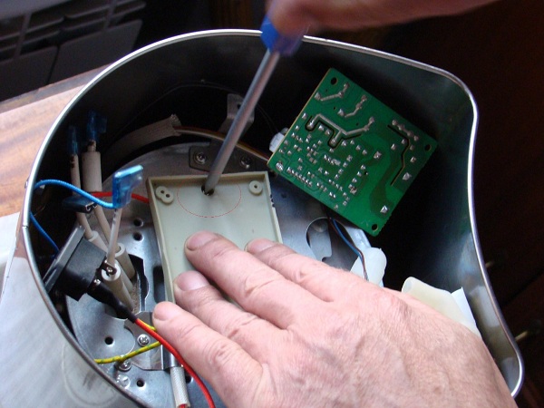 Screws under the gasket