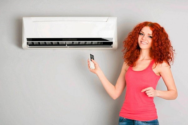 Redhead girl includes air conditioning