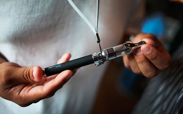 Electronic cigarette in hand