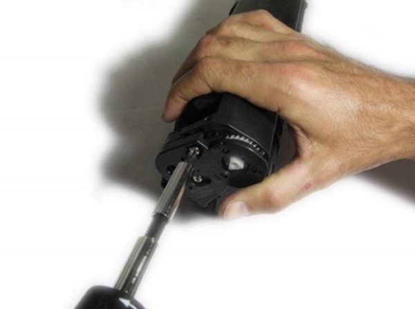 Removing housing plugs