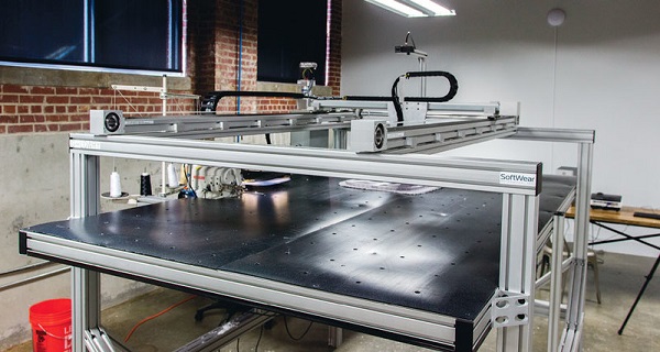 Robot able to sew clothes