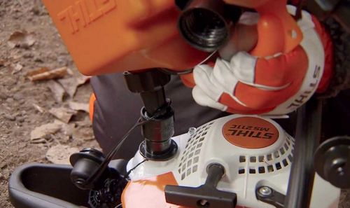 Refueling gas mowers