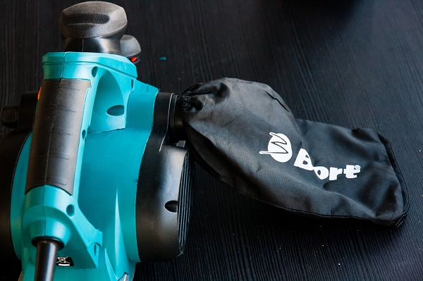 Tool with bag for chips
