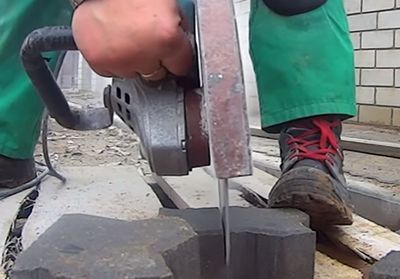 Cutting paving slabs grinder