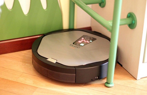Vacuum cleaner in the corner of the room