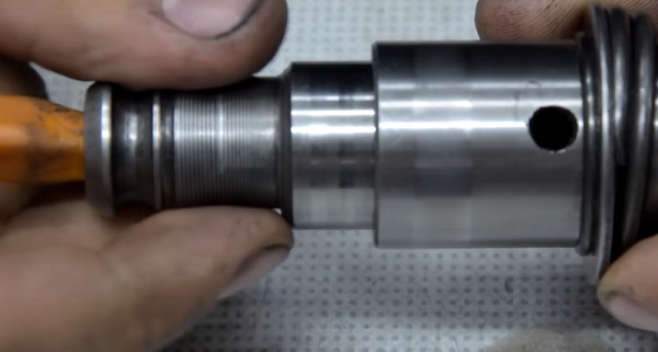 Squeezing the removed internal parts of the mechanism