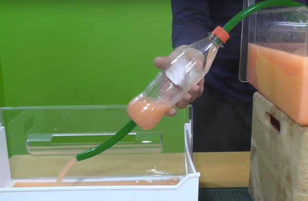 Hose in the bottom of the bottle