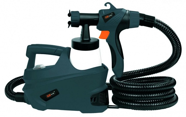 Spray gun with manual compressor